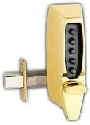 Mechanical push button door lock installed on a door