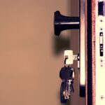 Close-up of a door lock with physical keys, illustrating smart locks with physical key backup